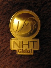 Золотой значок с Торжественного открытия Российского рынка NHT Global